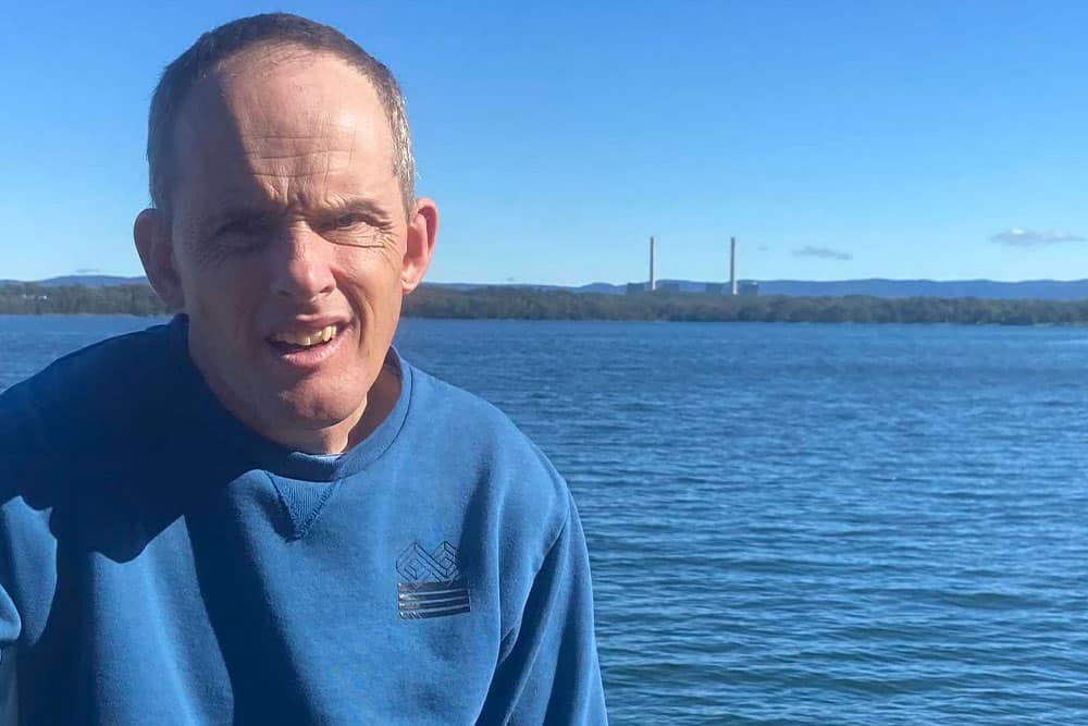 A Person in Front of a Large Body of Water — Gleam Support Services Pty Ltd in Weston, NSW