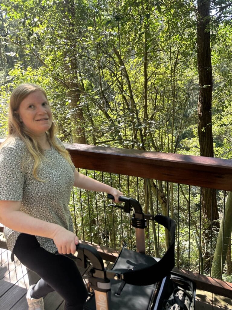 A Person Walking Amongst many Trees — Gleam Support Services Pty Ltd in Weston, NSW