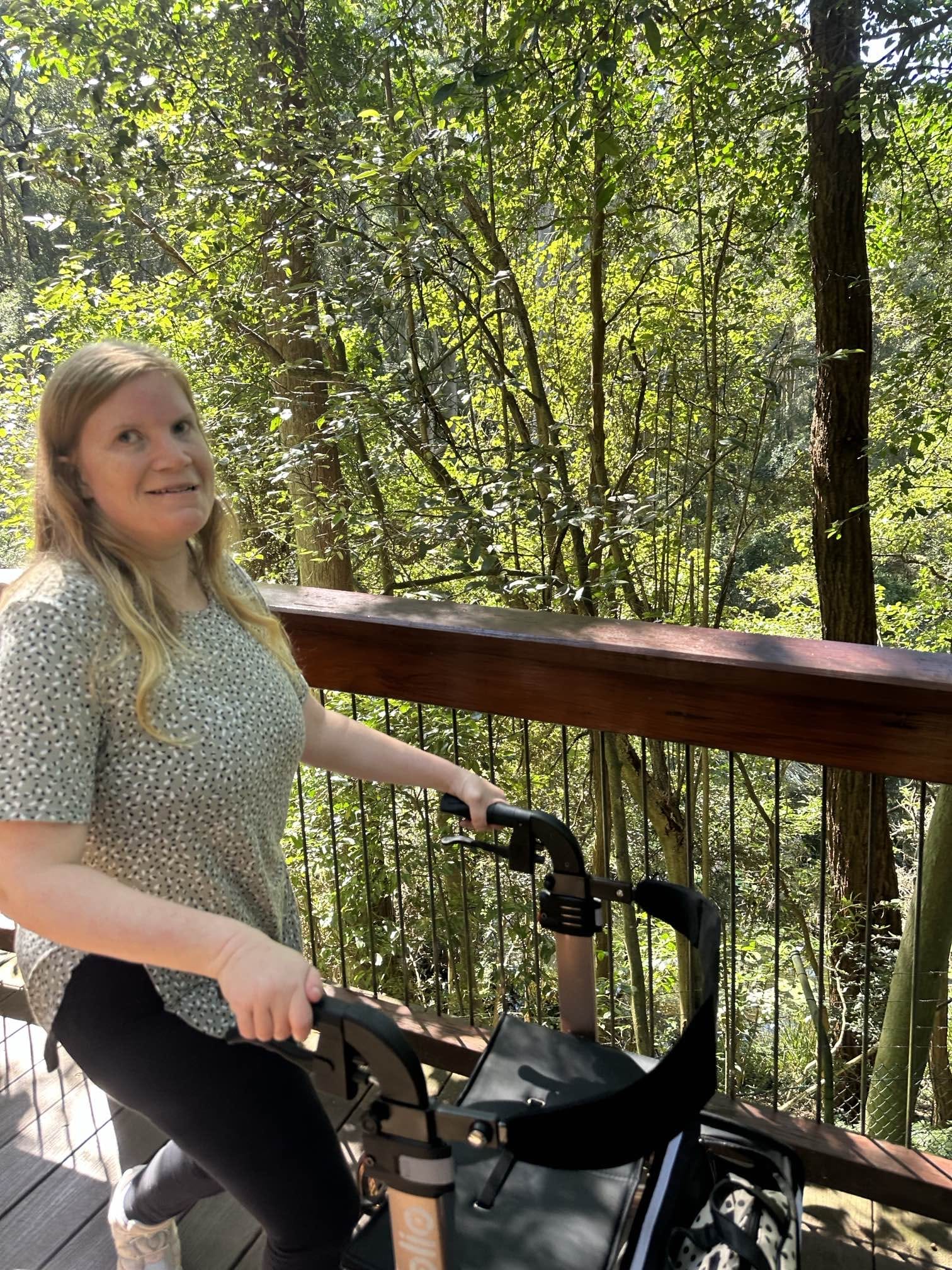 A Person Walking Amongst many Trees — Gleam Support Services Pty Ltd in Weston, NSW