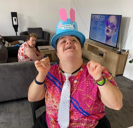Woman Wearing An Easter Hat — Disability Services in Weston, NSW