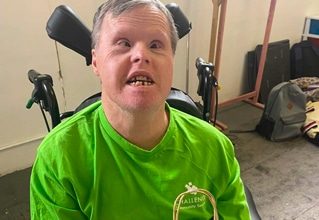 Man In Green Shirt — Disability Services in Weston, NSW