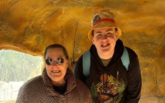 Two People Smiling in a Undercover Area — Gleam Support Services Pty Ltd in Weston, NSW