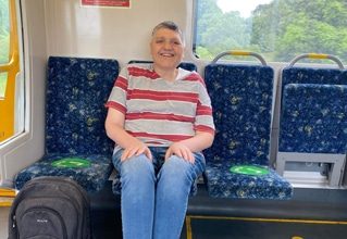 Person Sitting Inside A Bus — Disability Services in Lake Macquarie, NSW