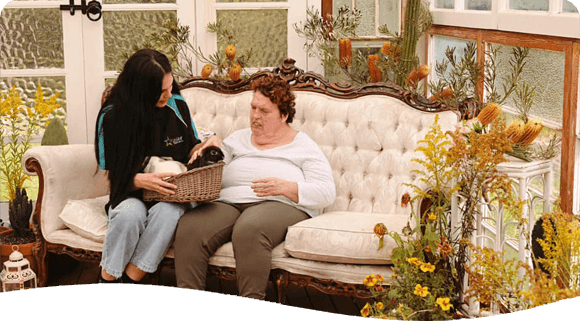 Two Women With Bunnies — Disability Services in Cessnock, NSW