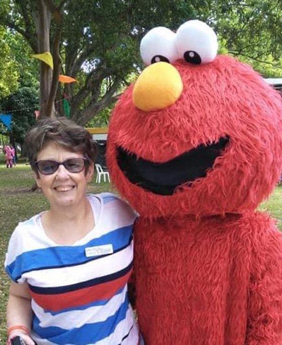 Woman With Elmo — Disability Services in Weston, NSW