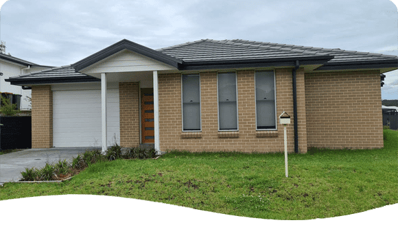 Residential House With Brick Walls — Disability Services in Weston, NSW