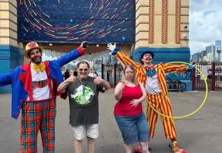 People Posing Outside a Building