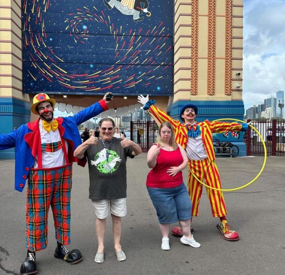 People Posing Outside a Building